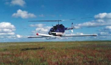 Helicopter-mounted magnetometer system.
